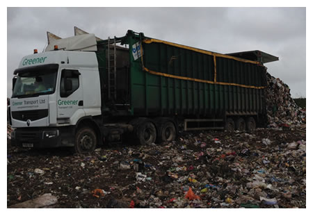 Ejector lorry discharging waste and a Norfolk landfill site
